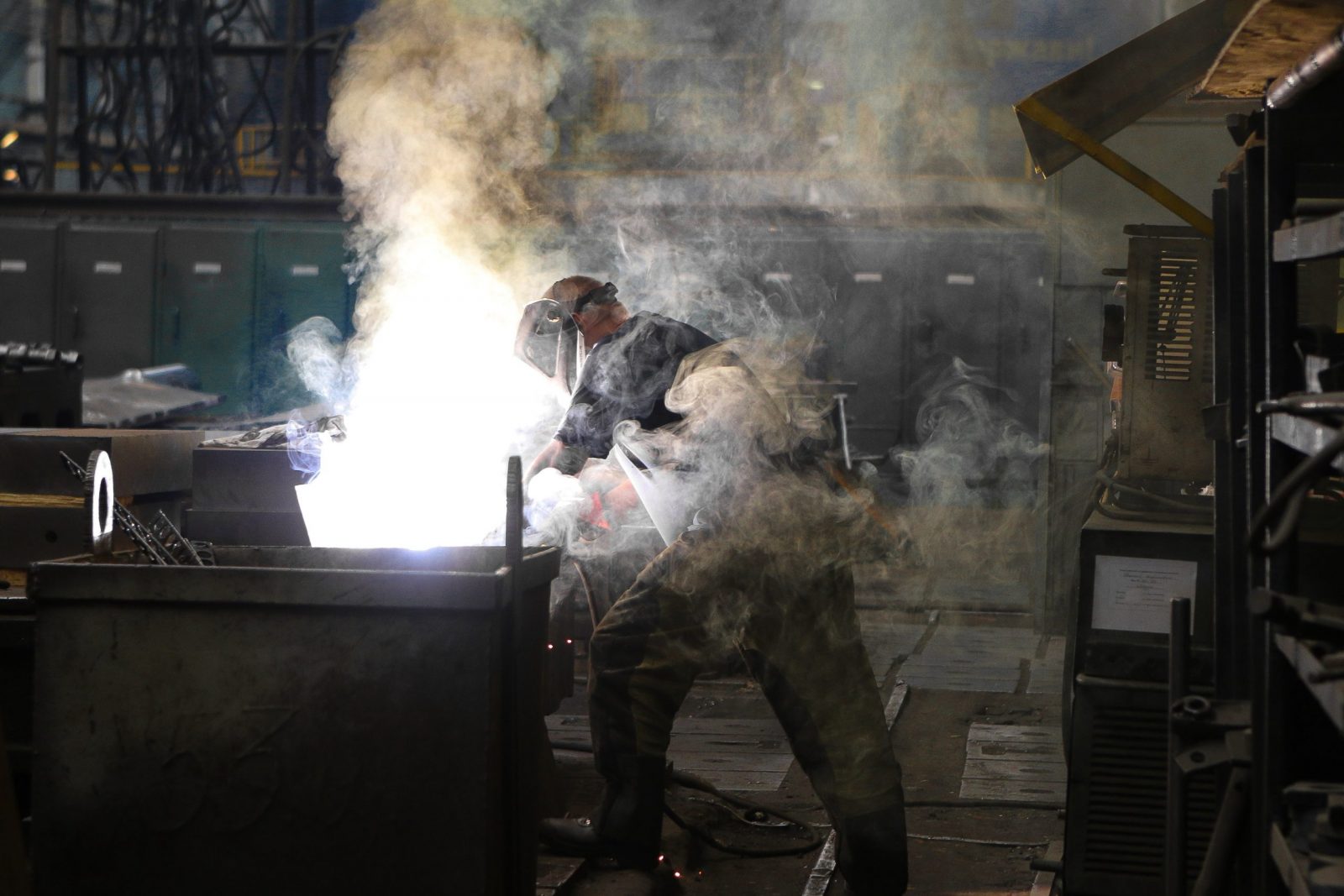 How to Choose the Right Health and Safety App for Your Organisation man-wearing-gray-shirt-and-welding-mask-covered-in-welding-2760344
